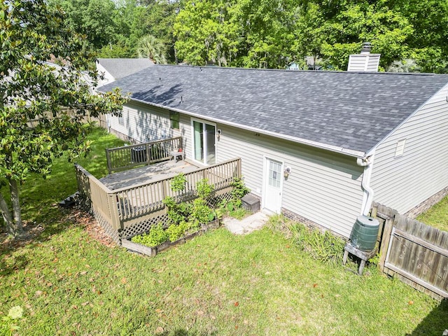 5 Drummond Ct, Charleston, SC 29414 - rear view of house featuring a deck, roof with shingles, and a chimney
