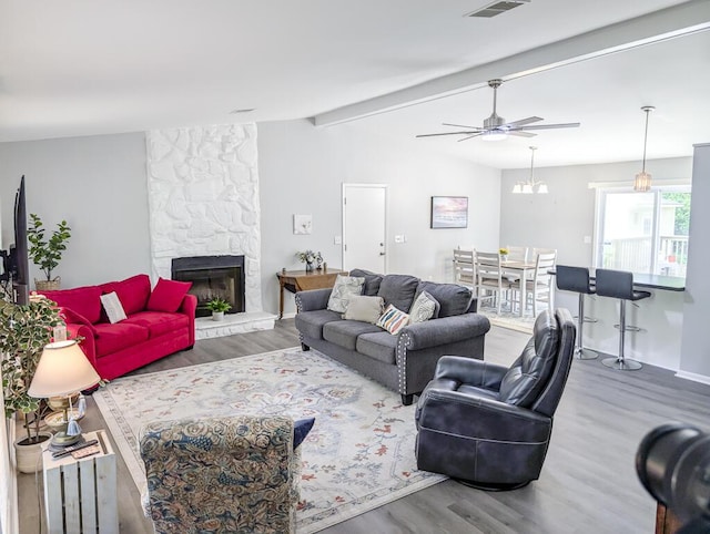 5 Drummond Ct, Charleston, SC 29414 - living area featuring wood finished floors, a ceiling fan, a large fireplace, and baseboards