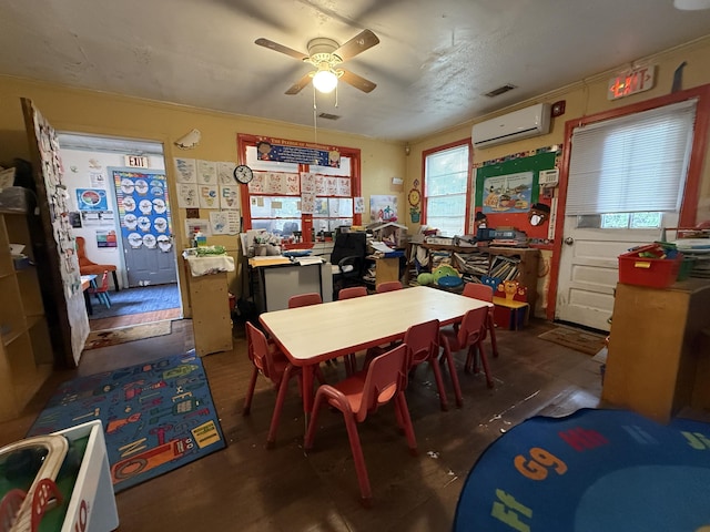715 Yew St, Charleston, SC 29407 - playroom featuring an AC wall unit and a ceiling fan