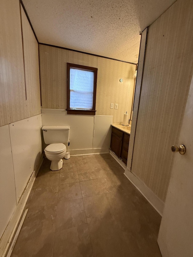 715 Yew St, Charleston, SC 29407 - bathroom with a textured ceiling, toilet, and vanity