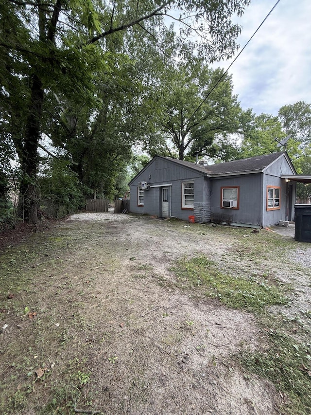 715 Yew St, Charleston, SC 29407 - back of house featuring concrete block siding and fence