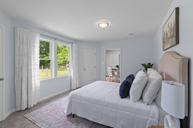 7239 Commodore Rd, Hollywood, SC 29449 - carpeted bedroom featuring baseboards