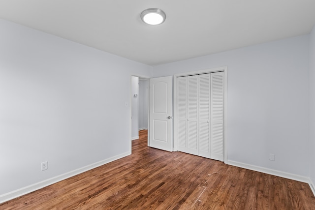 7239 Commodore Rd, Hollywood, SC 29449 - unfurnished bedroom with wood finished floors, baseboards, and a closet
