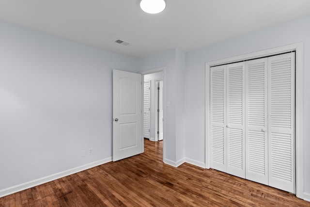 7239 Commodore Rd, Hollywood, SC 29449 - unfurnished bedroom featuring baseboards, wood finished floors, and a closet