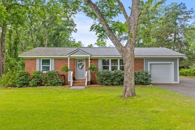 7239 Commodore Rd, Hollywood, SC 29449 - single story home featuring an attached garage, a front lawn, gravel driveway, brick siding, and a shingled roof
