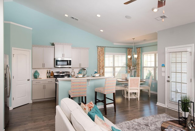 478 Rowley Ln, Summerville, SC 29486 - kitchen featuring vaulted ceiling, decorative backsplash, stainless steel appliances, and visible vents