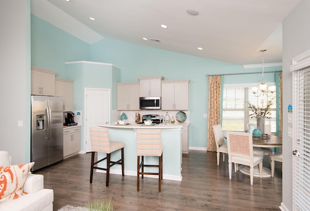 478 Rowley Ln, Summerville, SC 29486 - kitchen featuring tasteful backsplash, a kitchen island with sink, a chandelier, light countertops, and appliances with stainless steel finishes
