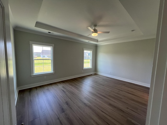 478 Rowley Ln, Summerville, SC 29486 - unfurnished room with a tray ceiling, baseboards, a ceiling fan, and dark wood finished floors