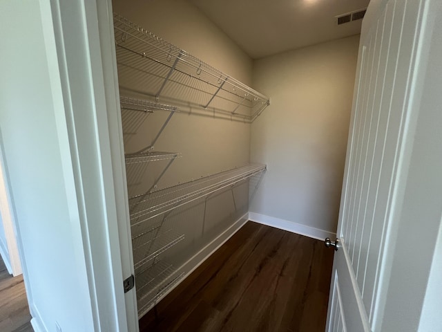 478 Rowley Ln, Summerville, SC 29486 - spacious closet with dark wood finished floors and visible vents
