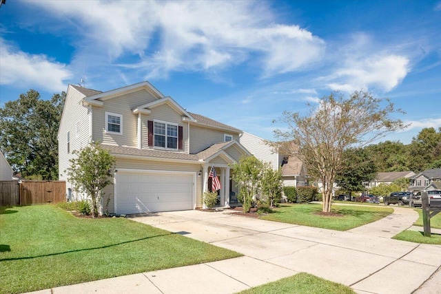 view of front of house featuring a front yard and a garage