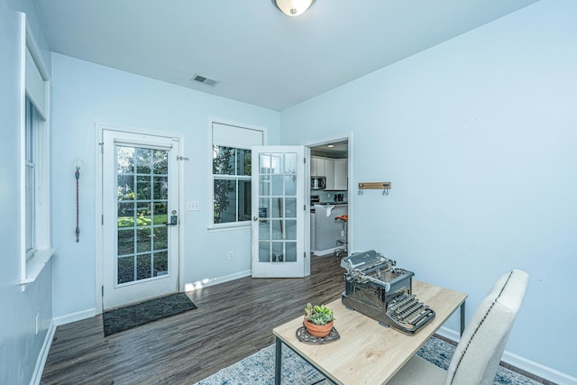 office area with french doors and dark hardwood / wood-style flooring