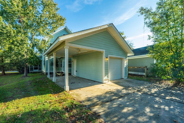 view of property exterior featuring a garage and a carport