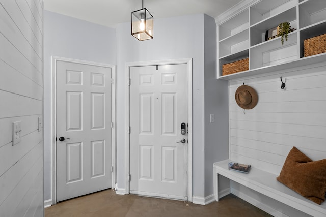 mudroom with concrete floors