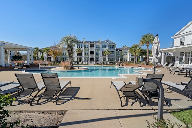 view of swimming pool featuring a patio