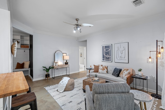 living room with ceiling fan and ornamental molding