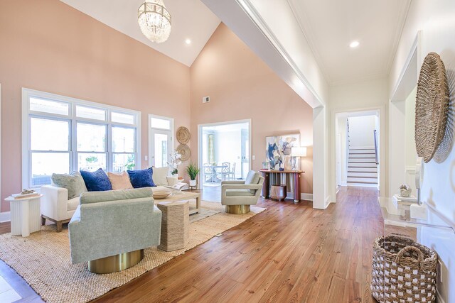 3130 Pignatelli Cres, Mount Pleasant, SC 29466 - living area featuring light wood-style floors, stairs, baseboards, a chandelier, and recessed lighting