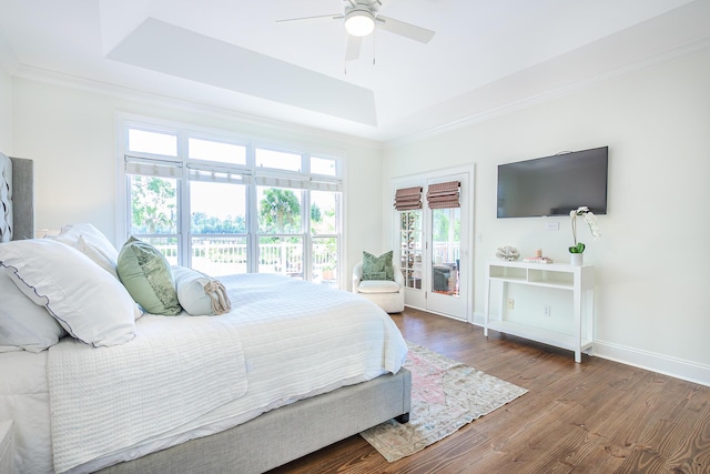 3130 Pignatelli Cres, Mount Pleasant, SC 29466 - bedroom featuring a tray ceiling, wood finished floors, crown molding, baseboards, and ceiling fan