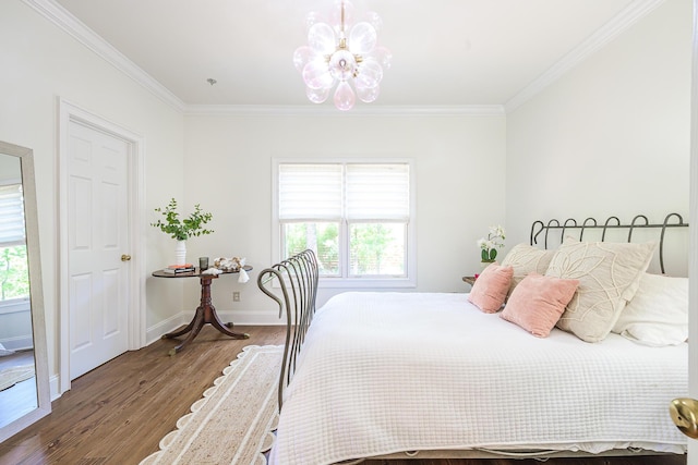 3130 Pignatelli Cres, Mount Pleasant, SC 29466 - bedroom featuring crown molding, wood finished floors, a chandelier, multiple windows, and baseboards