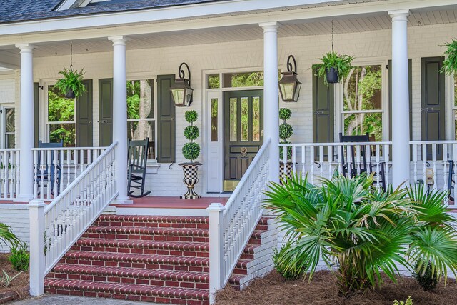 3130 Pignatelli Cres, Mount Pleasant, SC 29466 - doorway to property featuring covered porch and a shingled roof
