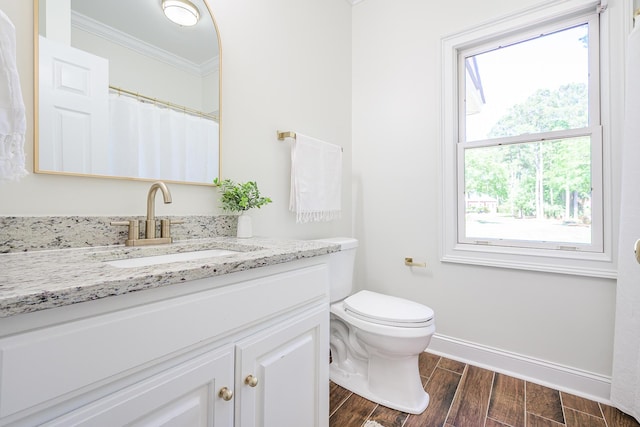 3130 Pignatelli Cres, Mount Pleasant, SC 29466 - full bathroom with crown molding, vanity, healthy amount of natural light, baseboards, and wood finished floors
