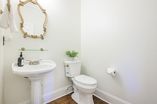 3130 Pignatelli Cres, Mount Pleasant, SC 29466 - bathroom featuring baseboards, toilet, and wood finished floors