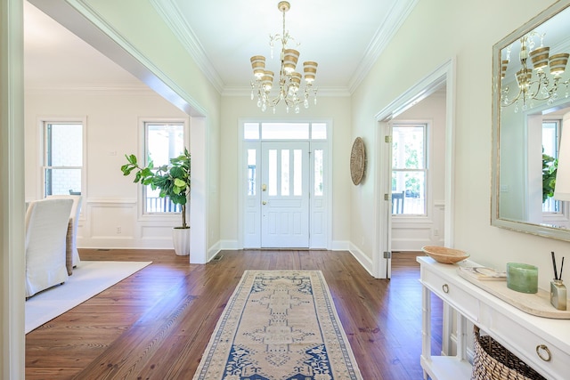 3130 Pignatelli Cres, Mount Pleasant, SC 29466 - foyer entrance featuring a chandelier, dark wood-style flooring, and ornamental molding