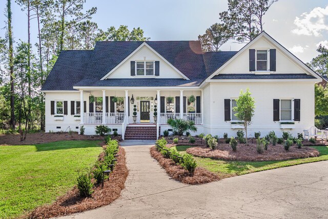 3130 Pignatelli Cres, Mount Pleasant, SC 29466 - view of front of property with covered porch, a front yard, and roof with shingles