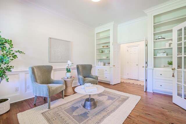 3130 Pignatelli Cres, Mount Pleasant, SC 29466 - sitting room with crown molding, wood finished floors, and built in shelves