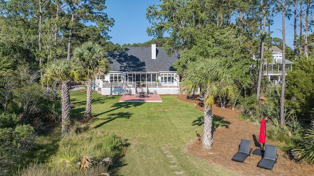 3130 Pignatelli Cres, Mount Pleasant, SC 29466 - rear view of property featuring a patio, a yard, a shingled roof, and a pool