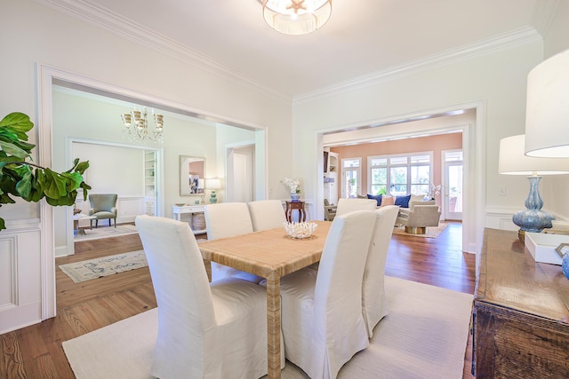 3130 Pignatelli Cres, Mount Pleasant, SC 29466 - dining area with ornamental molding, wood finished floors, and a chandelier