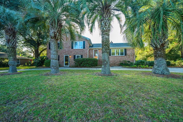 view of front of home with a front lawn