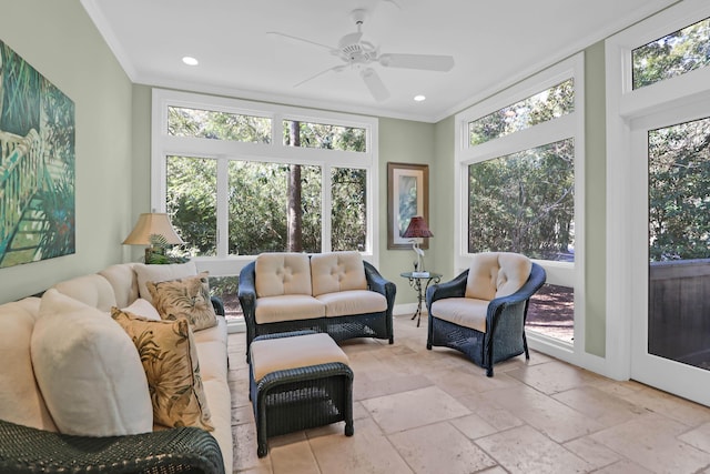 sunroom with ceiling fan