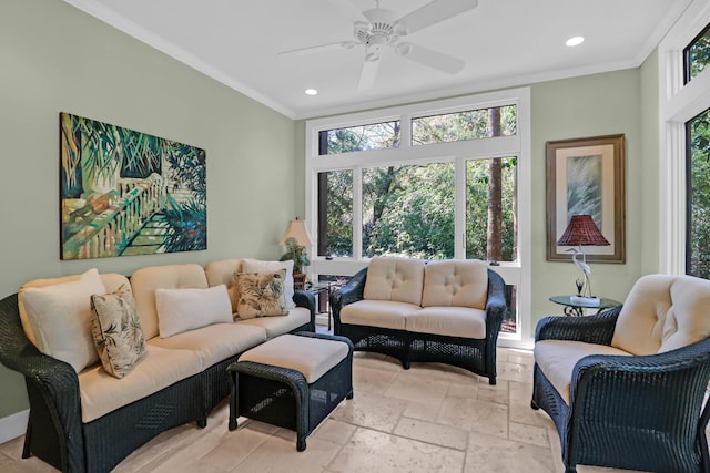 living area with recessed lighting, stone tile flooring, crown molding, and ceiling fan