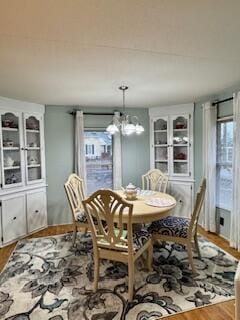 1045 Autumn Ln, Summerton, SC 29148 - dining area featuring a chandelier and wood finished floors