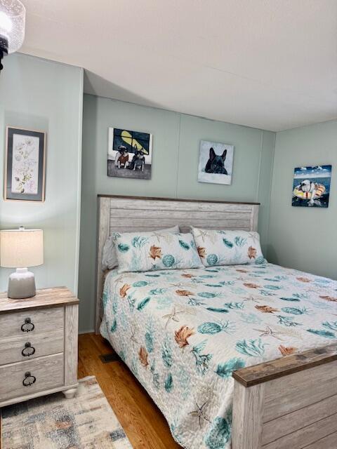 1045 Autumn Ln, Summerton, SC 29148 - bedroom with wood finished floors