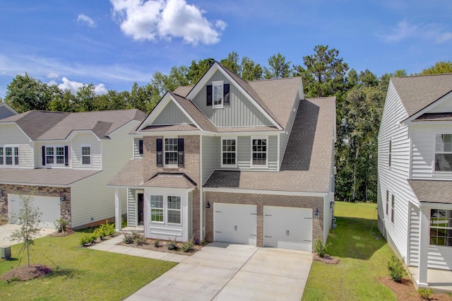 view of front of home featuring driveway, a front lawn, board and batten siding, and roof with shingles