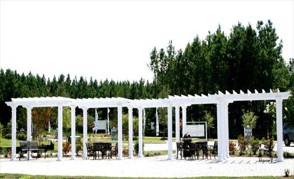 surrounding community with a pergola