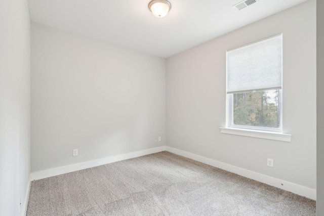 empty room featuring carpet flooring