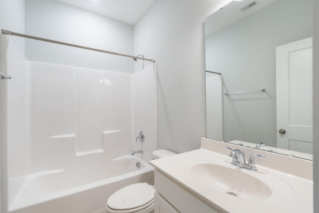 full bathroom with vanity, shower / bath combination, and toilet