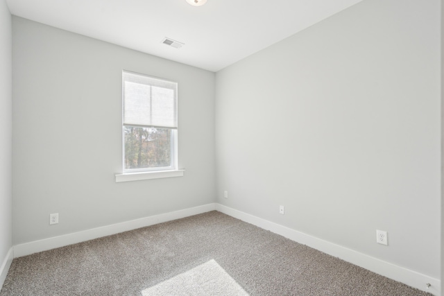 view of carpeted spare room