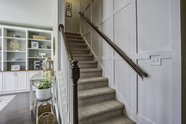 stairway featuring hardwood / wood-style flooring