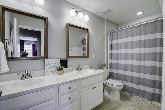 bathroom featuring a shower with curtain, tile patterned floors, vanity, and toilet