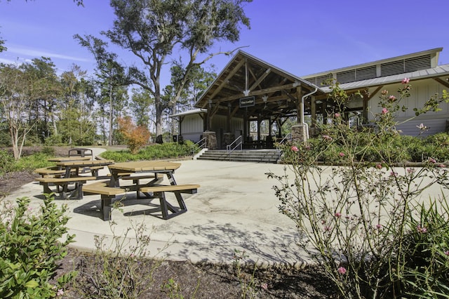 view of home's community with a patio