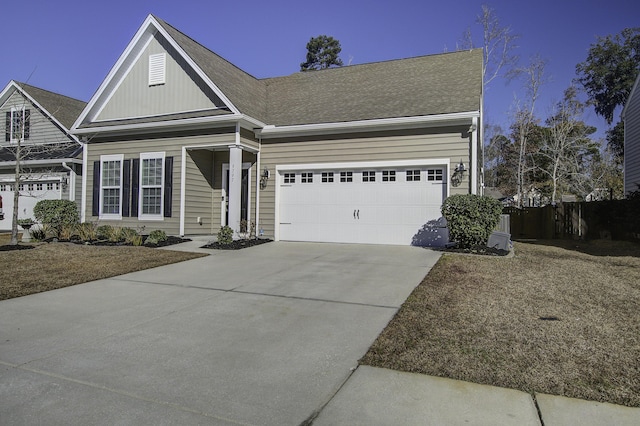 view of front of property with a garage