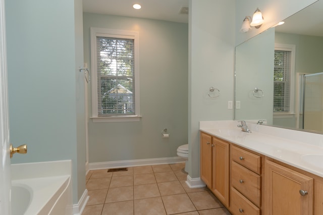 full bathroom with vanity, independent shower and bath, toilet, and tile patterned floors