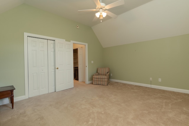 bonus room with lofted ceiling, light colored carpet, and ceiling fan