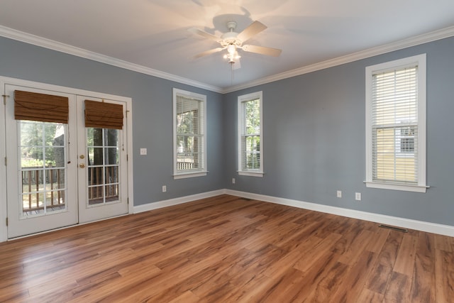 empty room with french doors and a healthy amount of sunlight