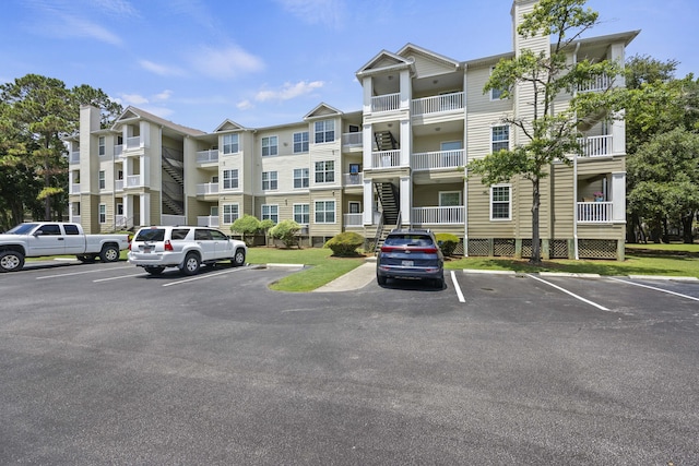 700 Daniel Ellis Dr Unit 10305, Charleston, SC 29412 - view of apartment building / complex featuring uncovered parking