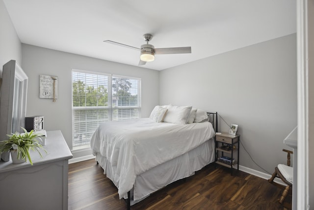 700 Daniel Ellis Dr Unit 10305, Charleston, SC 29412 - bedroom with dark wood-style floors, baseboards, and a ceiling fan