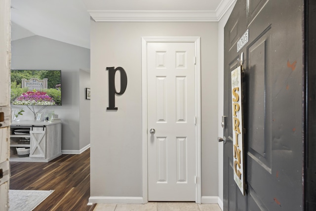 700 Daniel Ellis Dr Unit 10305, Charleston, SC 29412 - entryway with baseboards, ornamental molding, wood finished floors, and lofted ceiling